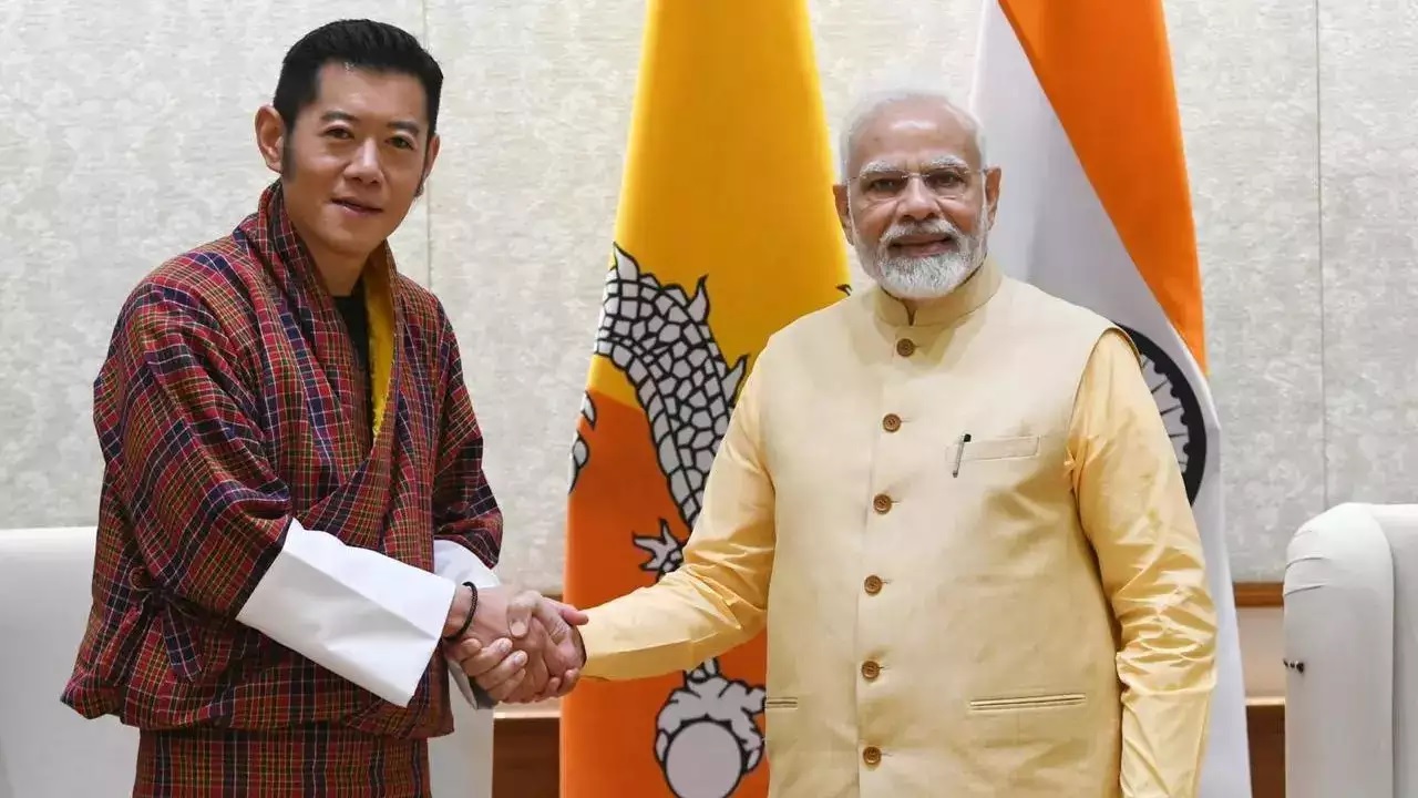 King of Bhutan wins hearts Namgyal Wangchuk comes to put PM Modi inside ship