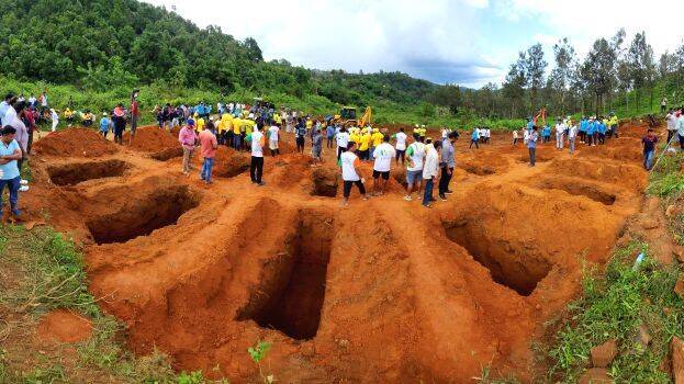 Bodies were mass buried in Wayanad raising the death toll to 387 1