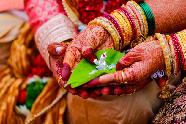 groom bride holding green leaf lord ganesha sculpture hand 75648 3615