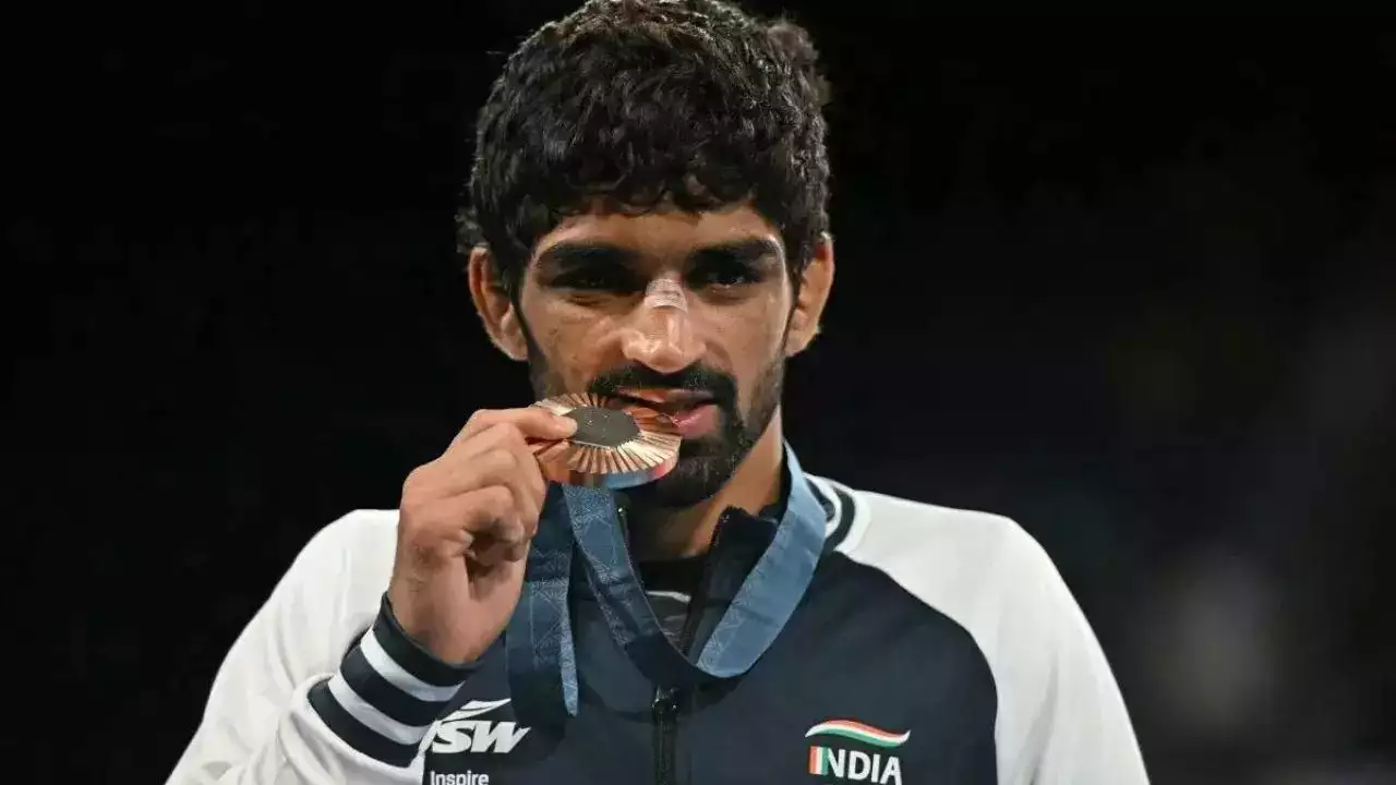 pm modi congratulated wrestler aman sahrawat on winning 12