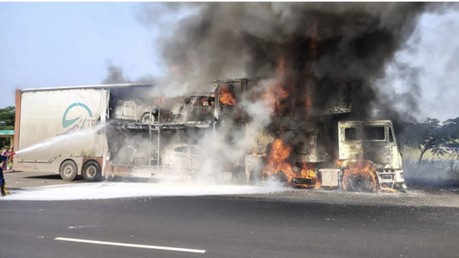 eight cars gutted as lorry transporting them catches fire in telangana