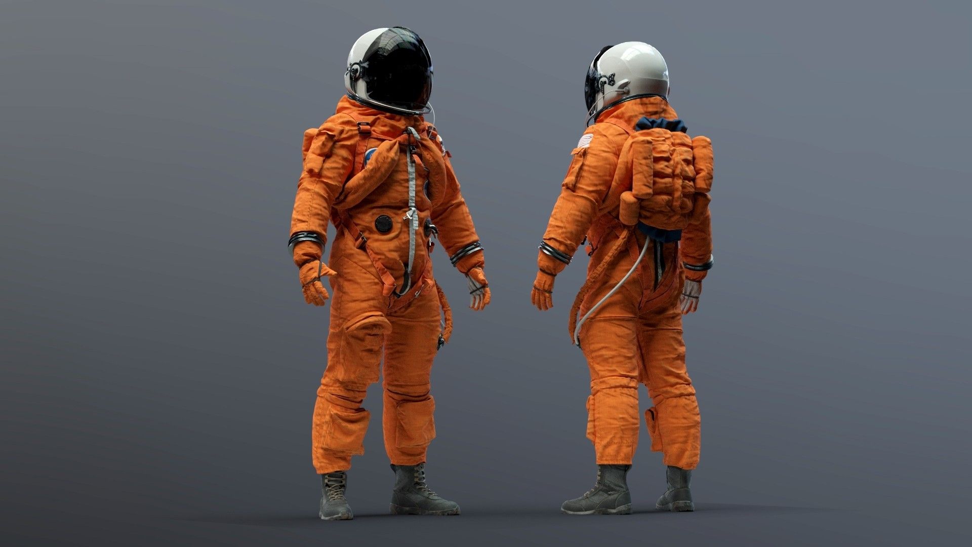 why do astronauts wear two types of space suits orange and white 1