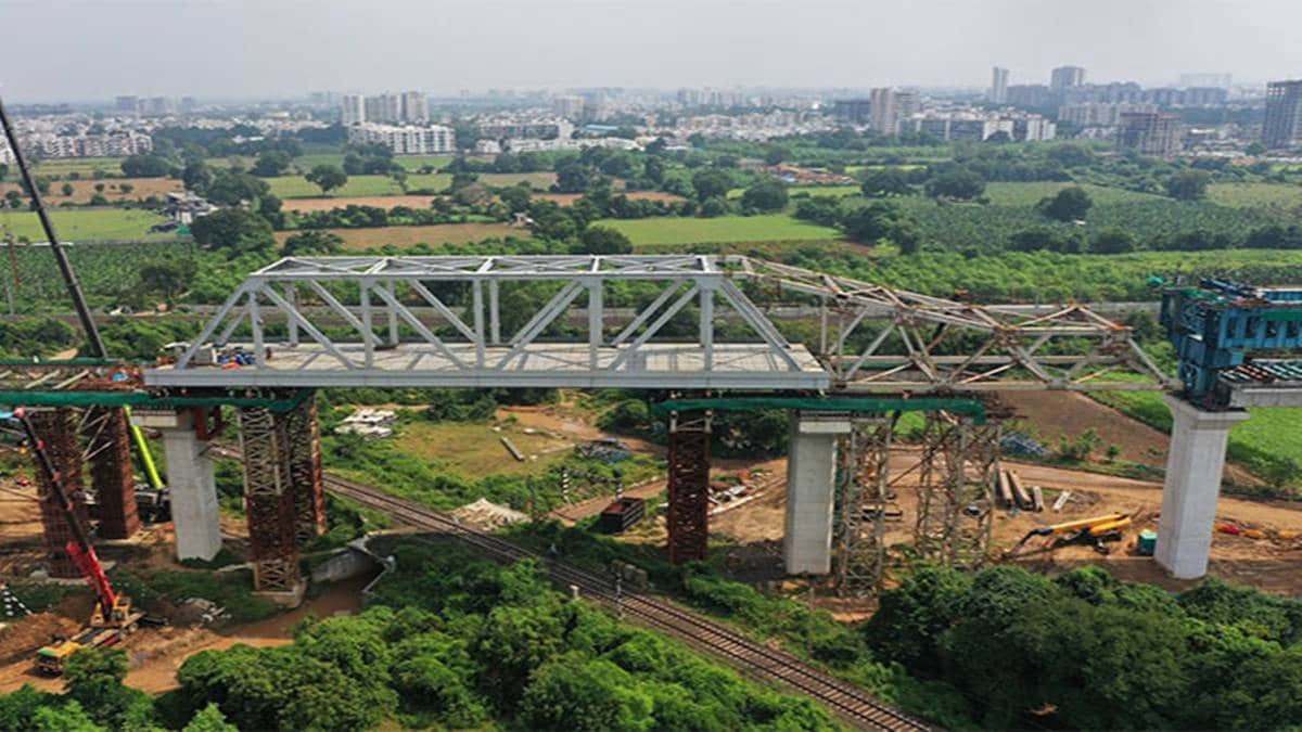 mumbai ahmedabad bullet train project 100 meter long steel girder lowered on four railway tracks in gujarat2