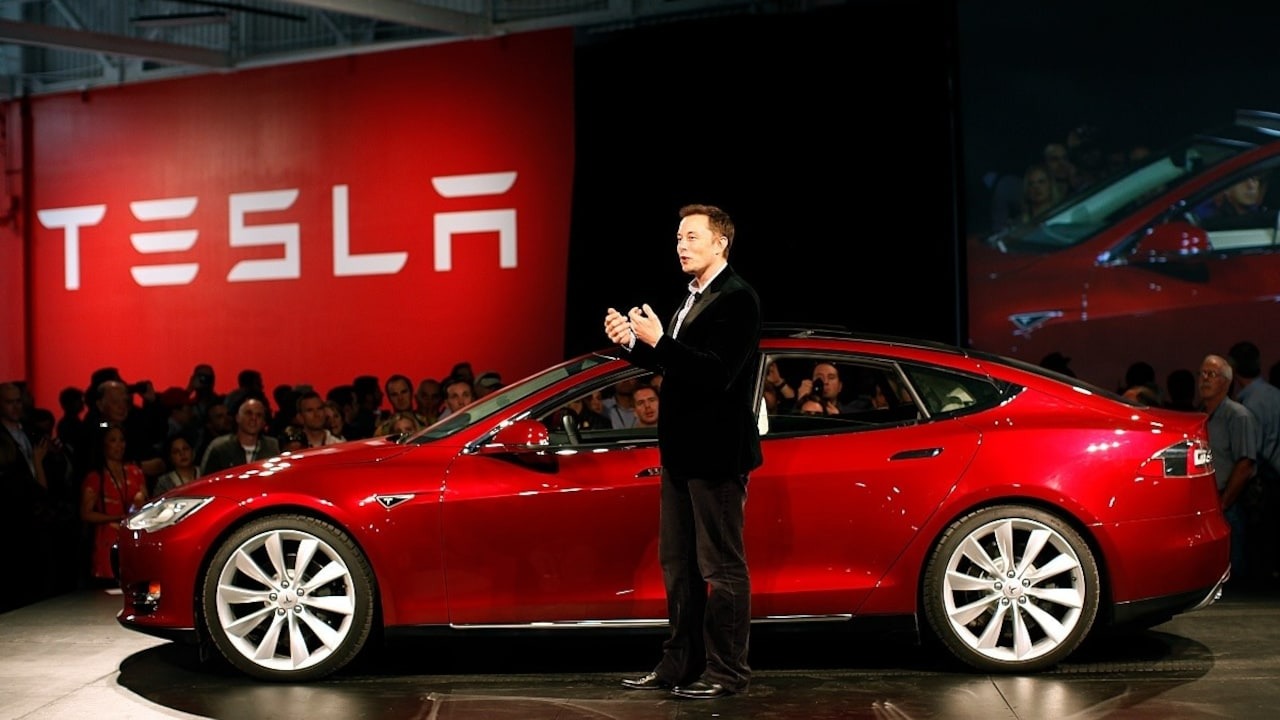 elon musk tesla company first showroom mumbai bandra 35 lakh rupees rent delhi aerocity