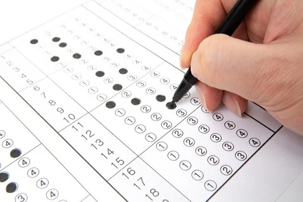 Mahisagar Allegations of irregularities in competitive exams principal accused of taking OMR seat