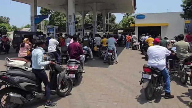 Petrol diesel shortage causes chaos in Vav Tharad people rush to fill drums and containers with fuel